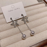 DIVASTRI Silver-Plated American Diamond Studded Korean Star Shaped Drop Earrings