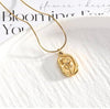Vintage-Style Embossed Tulip Flower Medallion Necklace with Snake Chain
