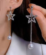 DIVASTRI Silver-Plated American Diamond Studded Korean Star Shaped Drop Earrings